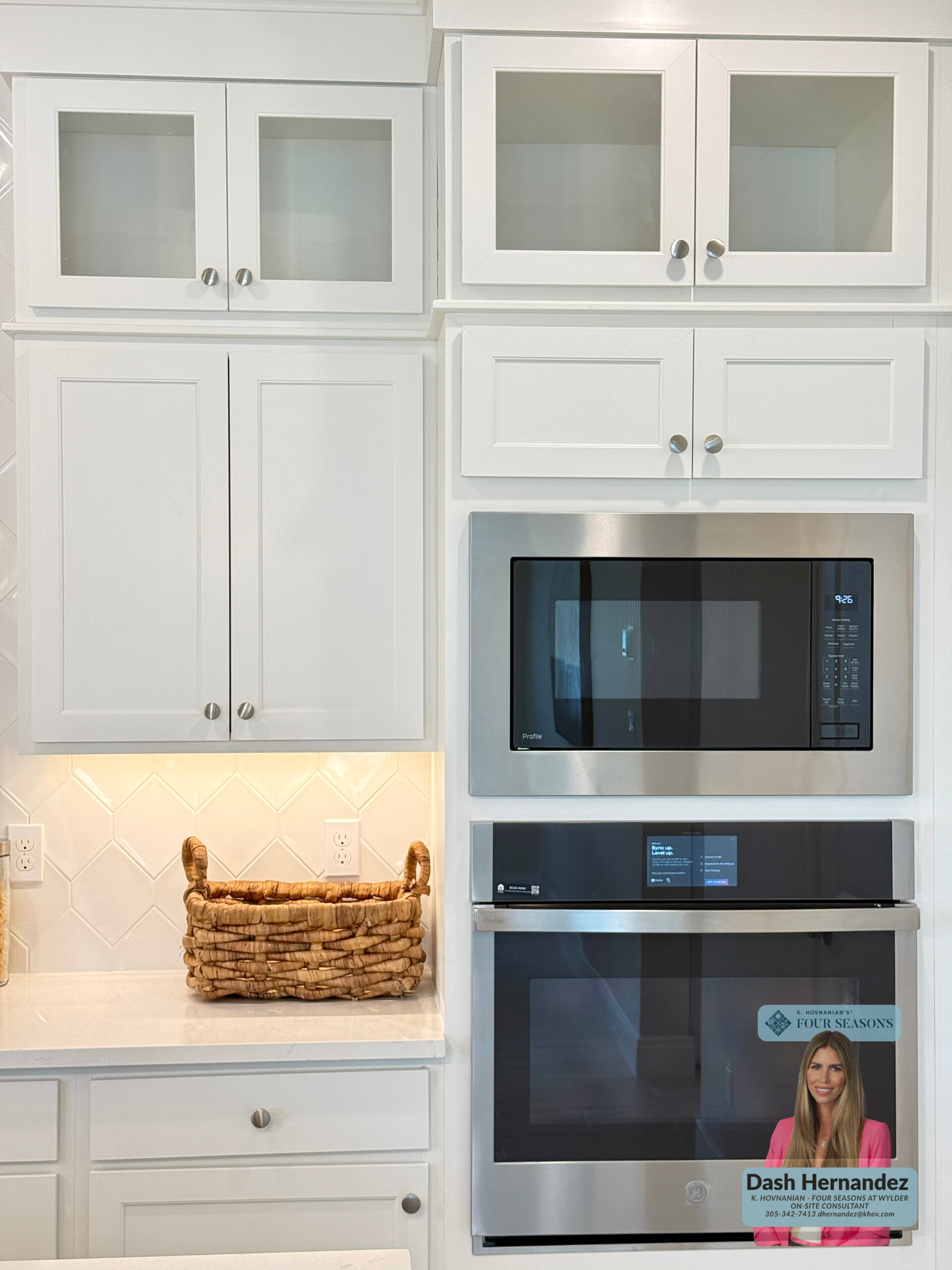 Bogart Model Kitchen | Four Seasons at Wylder K. Hovnanian Bogart Model Kitchen at Four Seasons at Wylder - Modern kitchen with large island and white cabinets by K. Hovnanian in Port St. Lucie, FL