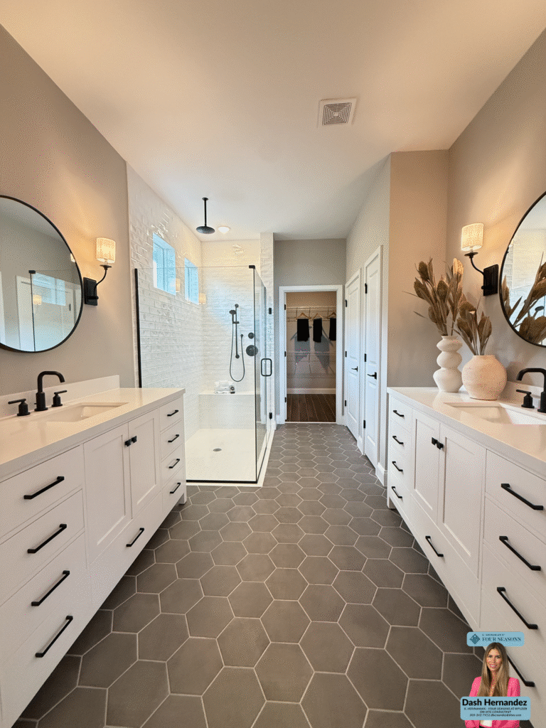 Farmhouse-style Astaire model bathroom with bright lighting and large mirror in a new Port St Lucie 55 plus community