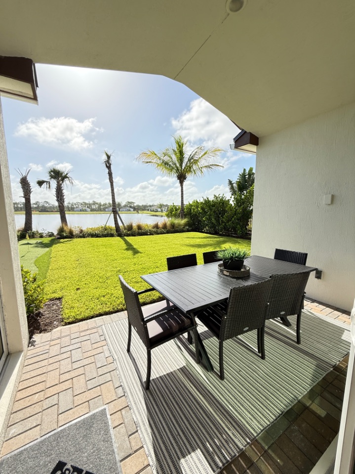 Astaire Covered Patio | Four Seasons at Wylder Outdoor Living Astaire Model Covered Patio - Outdoor living space with covered patio perfect for entertaining at Four Seasons at Wylder, Port St. Lucie