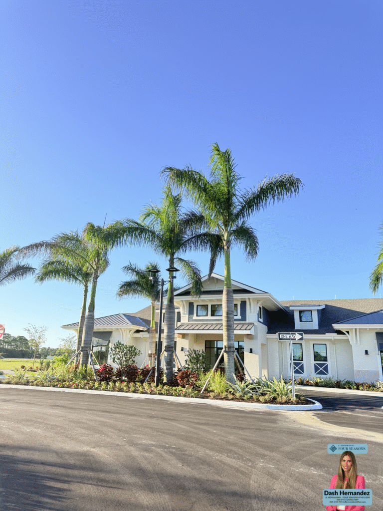 Amenities white home with palm trees Four Seasons at Wylder Port St Lucie 55+ community